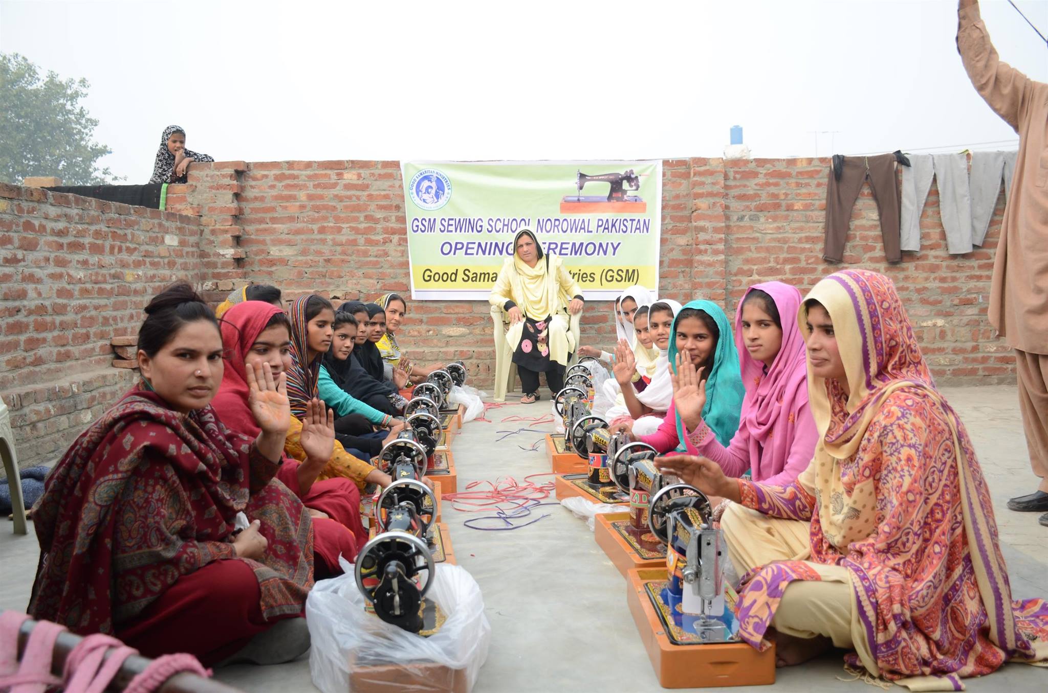 Graduate with Sewing Machine