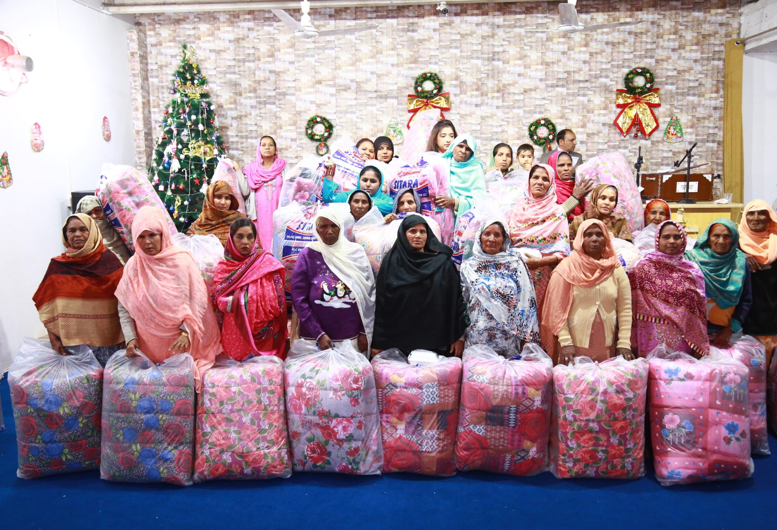 Widow Receiving Food Package in Pakistan